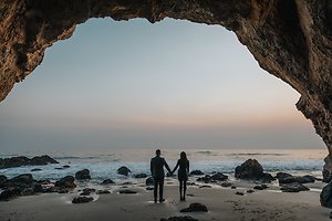 Couples & Relationships. Couple staring out to sea